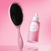 Lash Therapy Australia hair boosting serum and pink hair brush for thicker, healthier hair