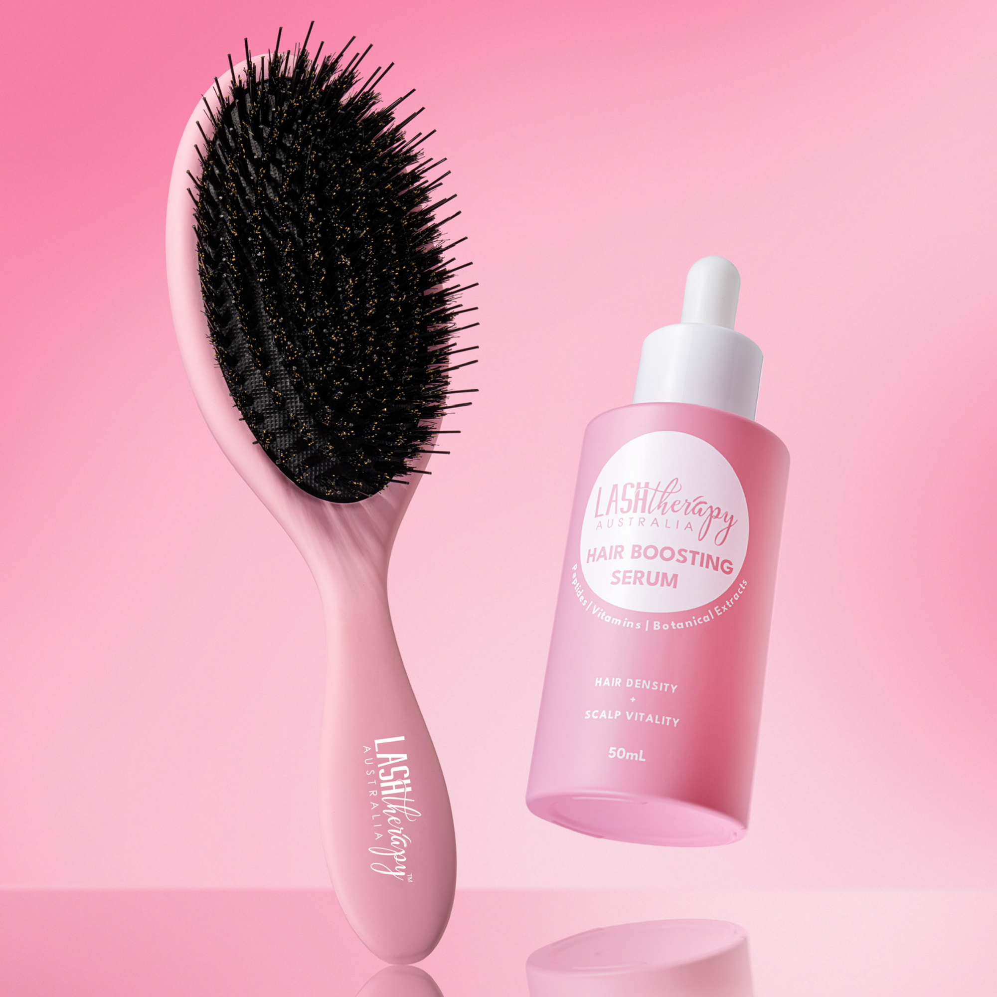 Lash Therapy Australia hair boosting serum and pink hair brush for thicker, healthier hair